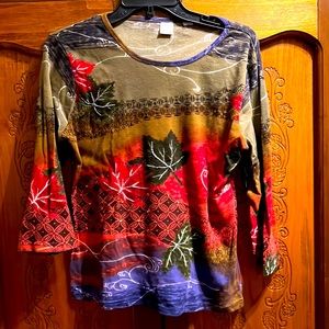 Fall long sleeve T-shirt with beads on the front Beautiful design.